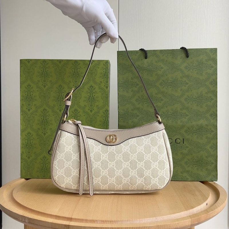 G*u*i top handle bags